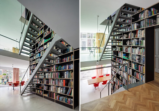 Illustration for article titled This Dream House Was Entirely Built Around a Giant Three-Story-High Bookshelf